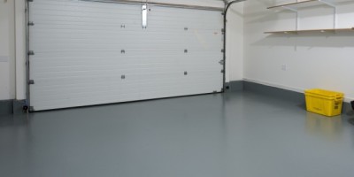Epoxy-garage-floor-with-dark-grey-color-DT_196562141-e1411534801642